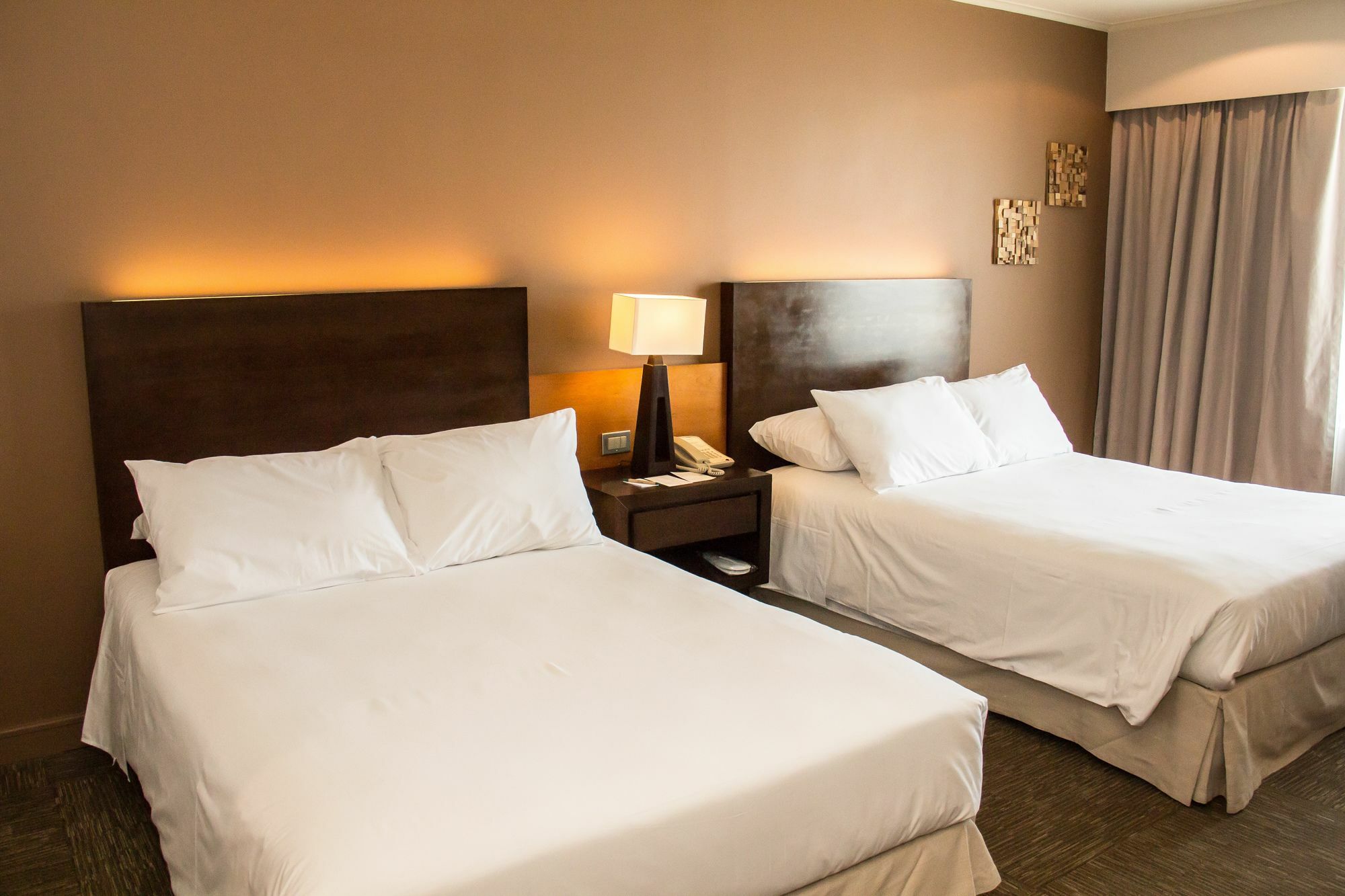 Mds Hotel Calama Luaran gambar A room at the Hilton Garden Inn