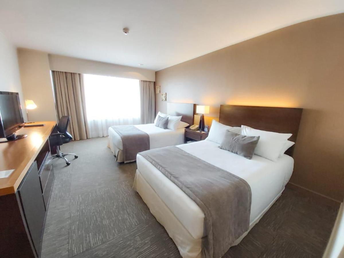 Mds Hotel Calama Luaran gambar A typical hotel room